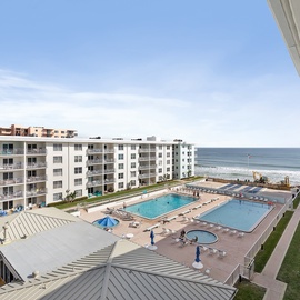 Pool and beach views from balcony!