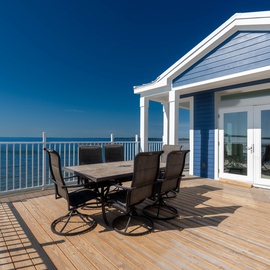 Expansive waterfront deck showcasing the iconic Sanibel Bridge!