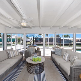 Plenty of seating to relax by the pool.