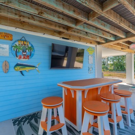 Hang out at the outdoor bar.