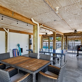 Relax in the shade beneath the house—challenge someone to a game of ping pong or fire up the grill for a laid-back afternoon.