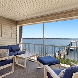 Shaded seating area with a beautiful view of the dock