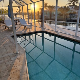 Enjoy the beautiful Sunset poolside.