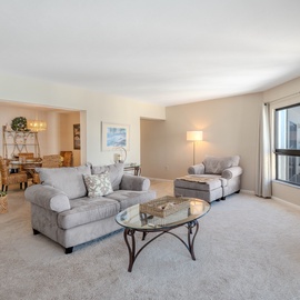 Open Floor Layout leads into Dining and Kitchen.