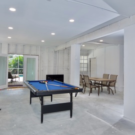 Pool table and ping pong table in garage