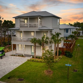Beautifully landscaped view of the front of the home.