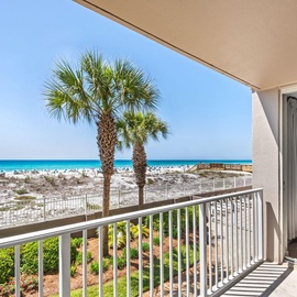 Step onto your private balcony and breathe in the salt air as you gaze at pristine white sands, swaying palms, and brilliant turquoise waters stretching to the horizon.