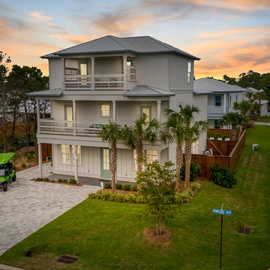 Beautifully landscaped view of the front of the home.