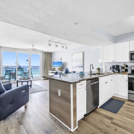 Unwind in your bright oceanfront condo where the kitchen flows into comfortable living space, all bathed in natural light from your private balcony overlooking the sea.
