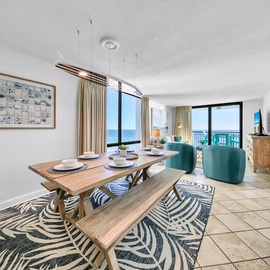 Your open-concept living space flows seamlessly from dining to relaxation, with stunning gulf views framing every meal and moment of rest.