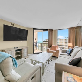 Relax in your bright living room with panoramic balcony views, perfect for morning coffee or evening entertainment.