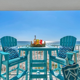 Sip your morning coffee or evening cocktail from these turquoise chairs while gulf waves sparkle endlessly before you.