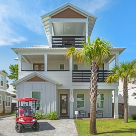 Beautifully landscaped view of the front of the home.