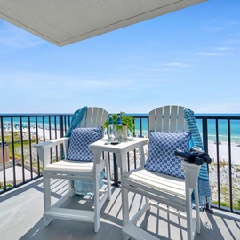 Unwind on your private balcony with two comfy chairs and a small table, perfectly positioned for morning coffee and breathtaking ocean views.
