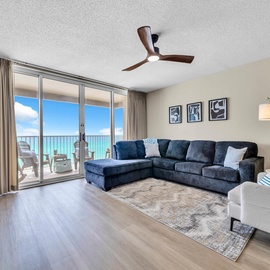 Unwind in your elegant living room while gazing at stunning ocean views through floor-to-ceiling windows.