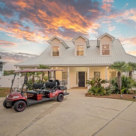 Take your complimentary golf cart on a ride to the beach!