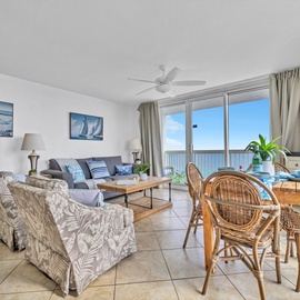 Sink into coastal comfort in your bright living space with Gulf views stretching to the horizon from your private balcony.