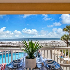 Your private balcony overlooks the sparkling pool and pristine beach, where morning coffee tastes better with endless gulf views and gentle sea breezes.