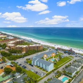 Coastal property situated just steps from pristine white sand beaches and emerald Gulf waters.