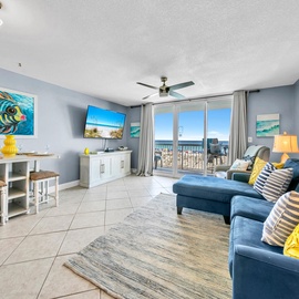 Relax in your coastal haven with Gulf views, tropical art, and comfy seating where you'll unwind after beach days.