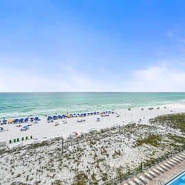 Stunning beachfront location with pristine white sand, turquoise waters, and convenient beach access steps away from the property.
