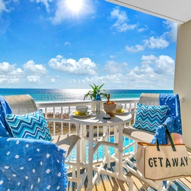 Sip your morning coffee while gazing at endless turquoise waters from your private Gulf-front balcony, complete with cozy seating.