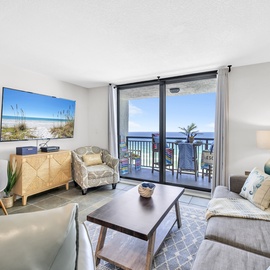 Welcome to Sundestin 902 - The Sweet Escape! Unwind in your bright coastal living room with ocean views and comfortable seating for perfect beach getaway relaxation.