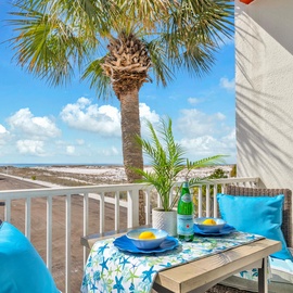 Sip morning coffee on your private balcony while soaking in stunning gulf views, swaying palms, and azure skies.