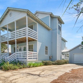 Settle into your beach retreat, where comfort and outdoor living come together effortlessly.