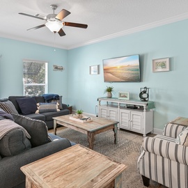 Unwind in your coastal-inspired living room with plush seating and calming ocean hues that instantly put you in vacation mode.