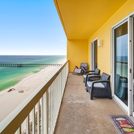 Step onto your private balcony and breathe in the ocean breeze while watching waves dance below your comfortable seating area.