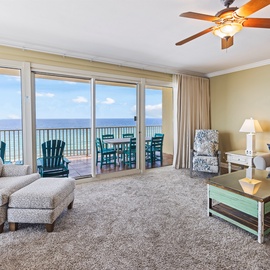 Unwind in your bright living room with stunning ocean views right from your cozy sofa.