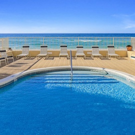 Dive into crystal-clear waters while soaking in breathtaking ocean views from your private poolside paradise.