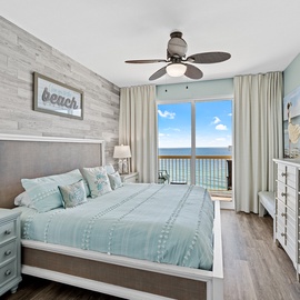 Picture yourself waking up to stunning ocean views through floor-to-ceiling glass doors, where the soothing palette of aqua and white creates your perfect coastal retreat.