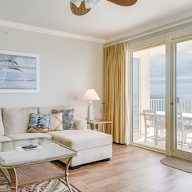 Relax in your coastal living room with ocean views and comfortable seating for peaceful mornings and sunset evenings.