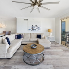 Relax in your bright coastal haven with panoramic ocean views, plush seating, and elegant nautical touches throughout.