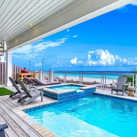Dive into your private pool with stunning ocean views stretching to the horizon from this beautiful rooftop terrace.