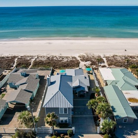 Stunning beachfront property with pristine white sand and turquoise waters just steps from your door.