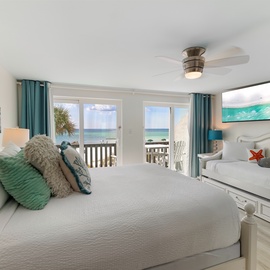 Wake up to sparkling turquoise waters stretching beyond your private balcony. This serene coastal retreat offers the perfect blend of comfort and seaside charm for your beach getaway.