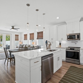 Your modern open-concept kitchen flows seamlessly into the living area, creating the perfect space for cooking and entertaining together.