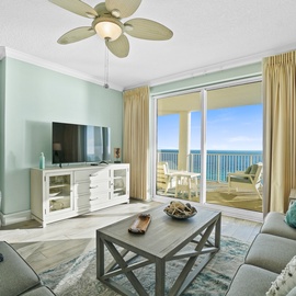 Relax in your coastal living room with stunning ocean views, where soft sea-green tones and comfortable seating create the perfect beachside retreat.