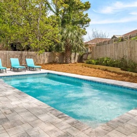 Your private pool awaits with comfortable loungers and tropical landscaping for perfect sunny afternoons.