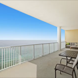 Your private oceanfront balcony offers stunning sea views and comfortable seating for morning coffee or sunset dining.