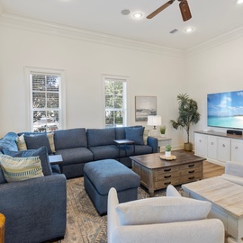 Sink into plush seating while tropical scenes play on your large TV, creating the perfect retreat for relaxing evenings.