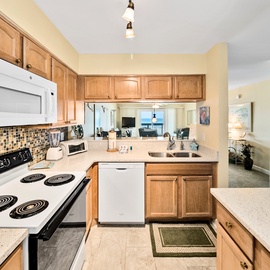 Your fully-equipped kitchen features warm wood cabinets, granite counters, and everything you need to create memorable vacation meals together.