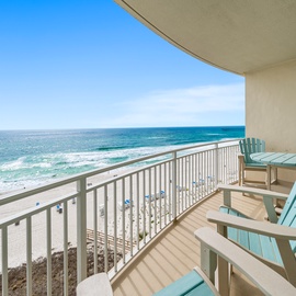 Sip morning coffee in your private oceanfront chairs while watching waves roll onto pristine sand below.