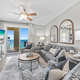 Sink into plush seating while ocean breezes flow through your bright living space, where stunning turquoise views await just beyond your private balcony.