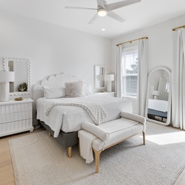 Sink into luxury in your dreamy all-white bedroom with plush linens and private balcony access for perfect morning coffee moments.