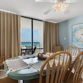 Gather around your bright dining table with stunning ocean views just beyond your private balcony doors.