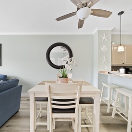 Unwind in your bright, airy space where soft coastal touches meet modern comfort—perfect for morning coffee or evening meals together.